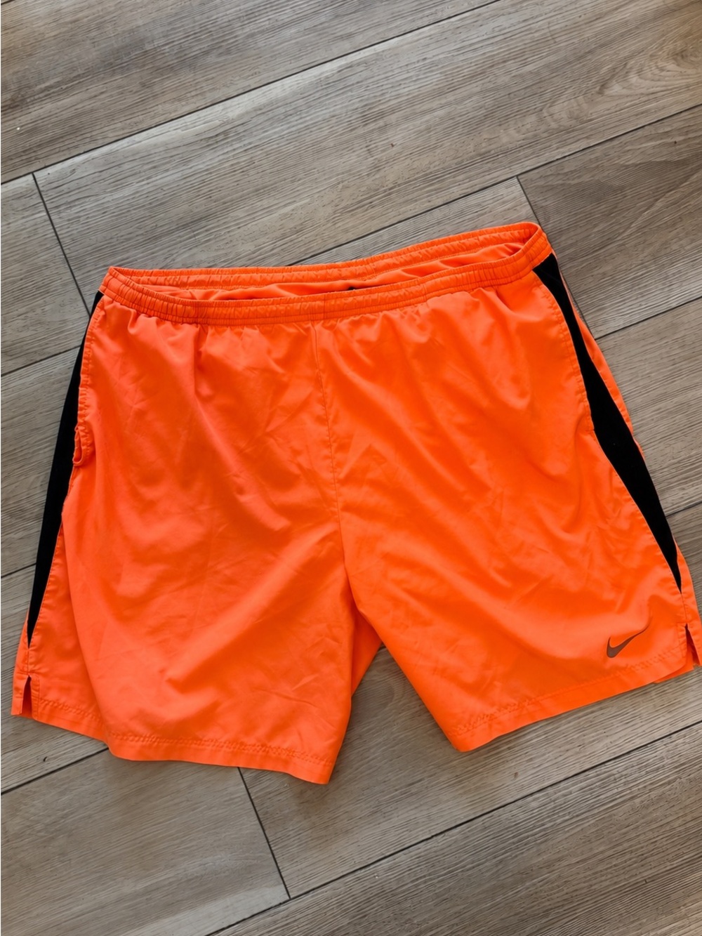 Nike Men’s Bright Orange Athletic Shorts with Black Side Stripes